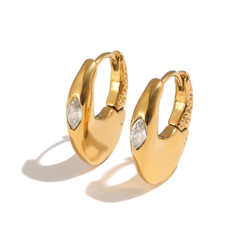 Pair of Gold Mini Solitaire Huggies with marquise simulated diamonds, front view on white